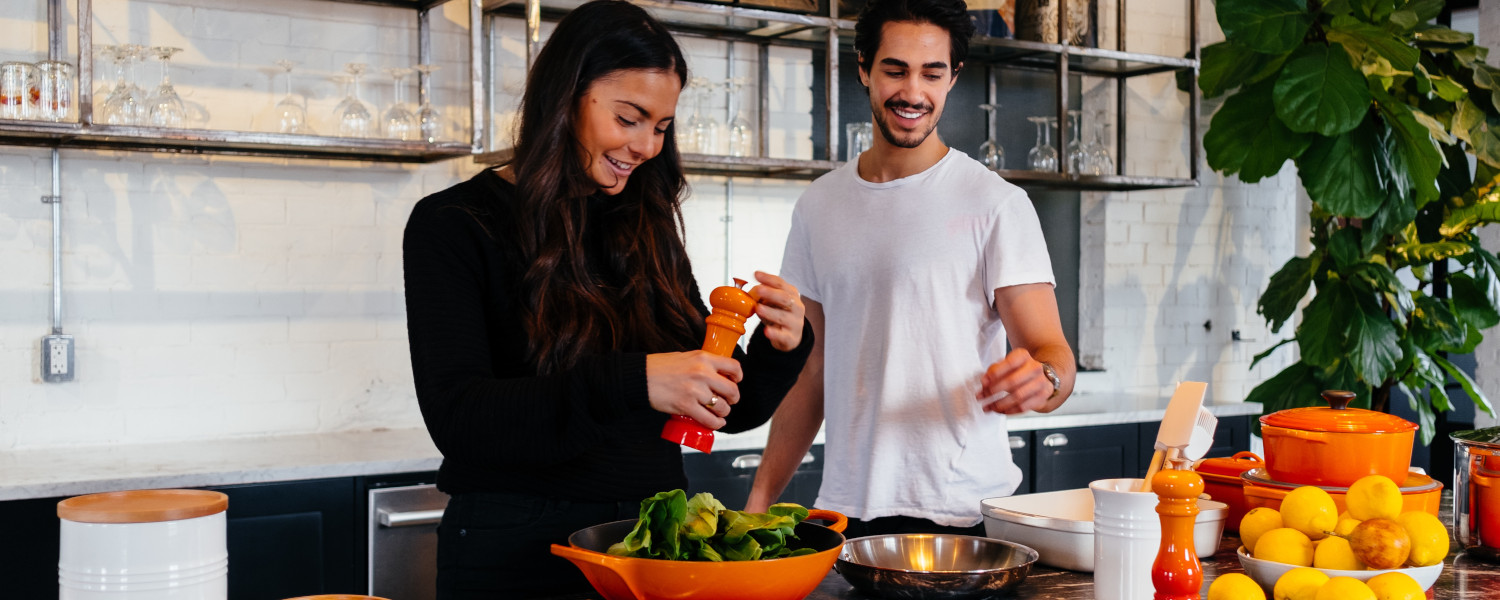 couple cooking with edible calculator