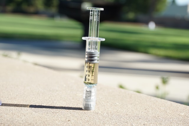 Vial of THC distillate closeup