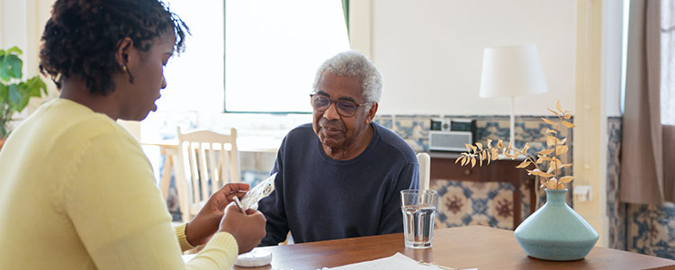 caregiver helping a patient